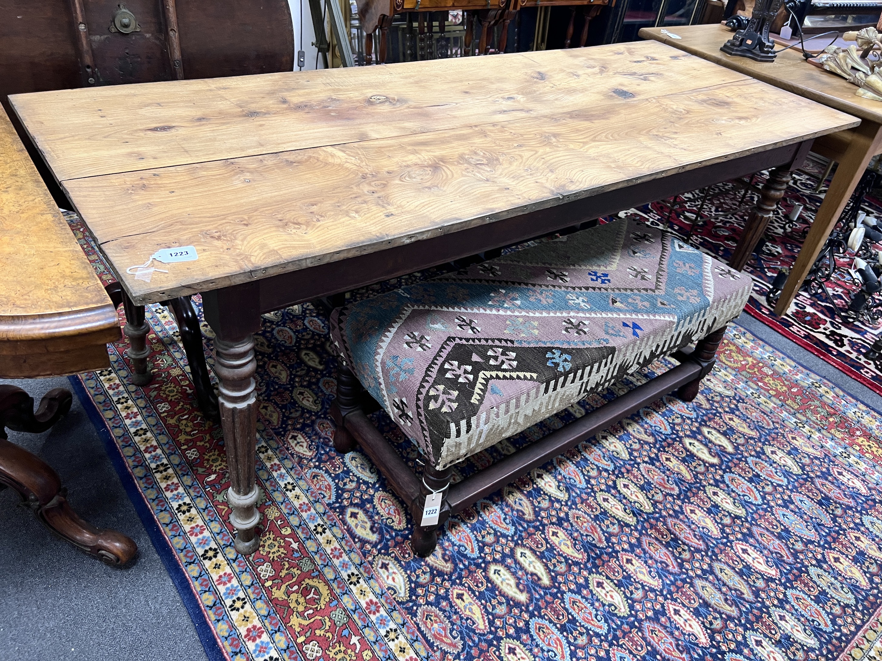 A 19th century French oak and fruitwood kitchen table, length 194cm, width 74.5cm